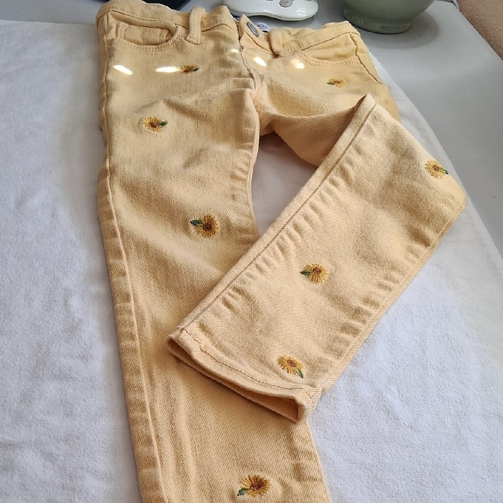 Cute Yellow Rockstar Jegging With Beautiful Flowers Applique.